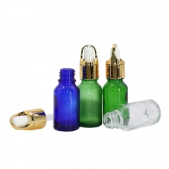 Color Clear Glass Dropping Bottles for sale , Golden Cap Dropper Bottle for Hair Essential Oil