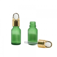 Color Clear Glass Dropping Bottles for sale , Golden Cap Dropper Bottle for Hair Essential Oil